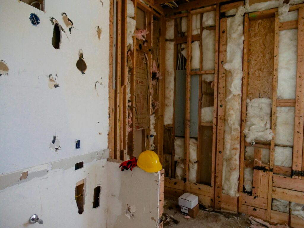 An interior space undergoing reconstruction and demolition for renovation.