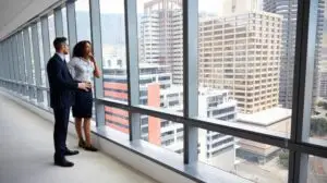 Commercial real estate investor reviewing property information for a potential commercial property investment.