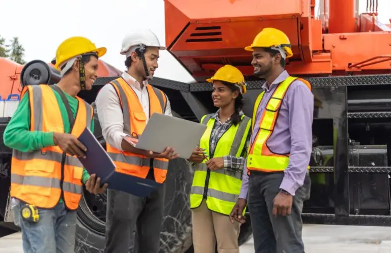 Contractor reviewing a job site and business expenses representing working capital financing for service businesses.